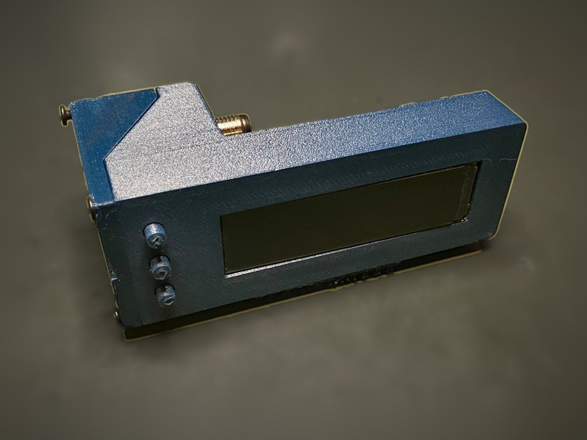 Front of the Agile v1.0 prototype, showing the wide display window and three buttons beside it