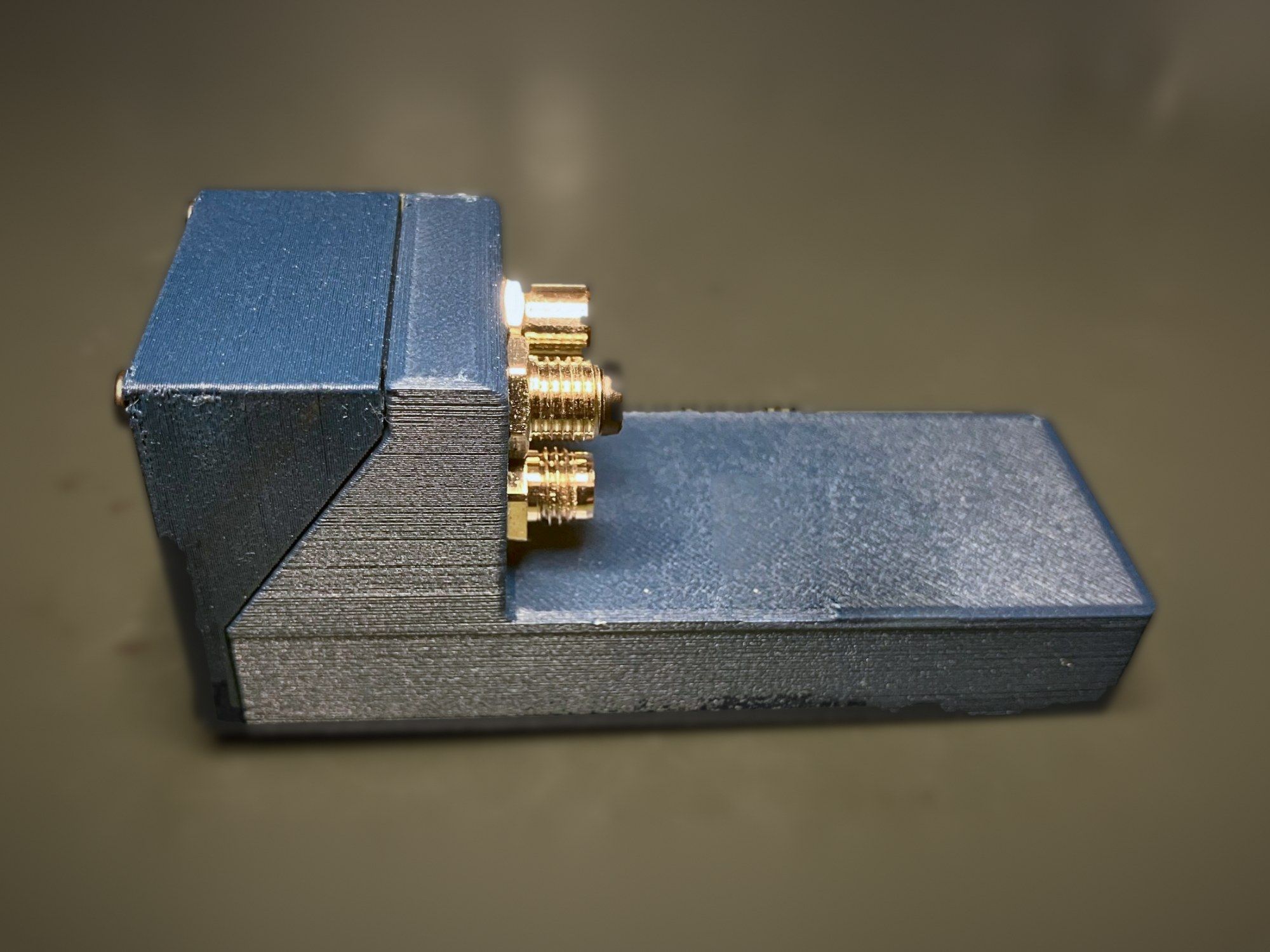 Side view of the Agile v1.0 enclosure with the connectors protruding from the rear panel